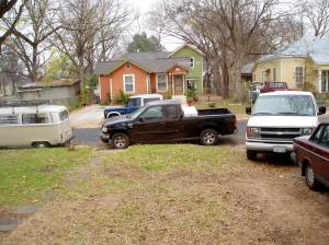 carpenter, foundation guy and plumber's respective vehicles parked in front of my house
